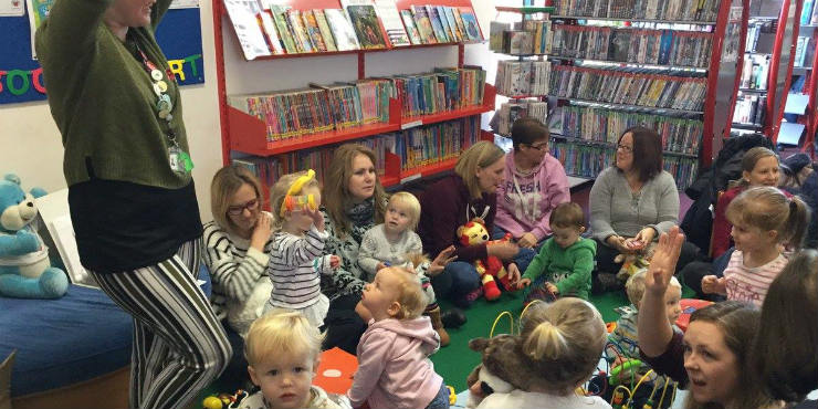 Children and parents at a story and activity session