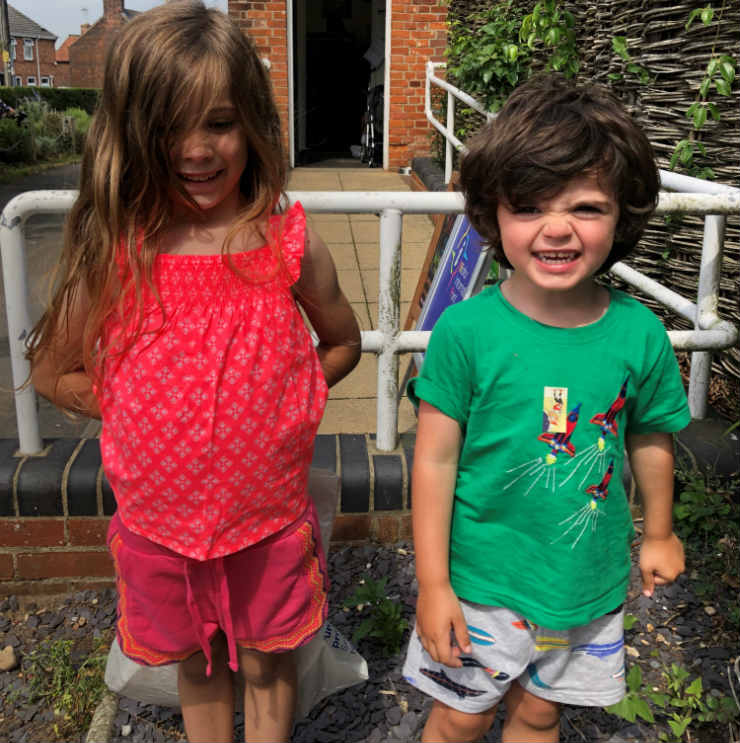 Young fundraisers Ivy and Bertie outside Southwold Library