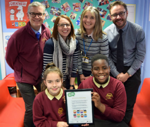 Staff and pupils at The Oaks school making their reading pledge