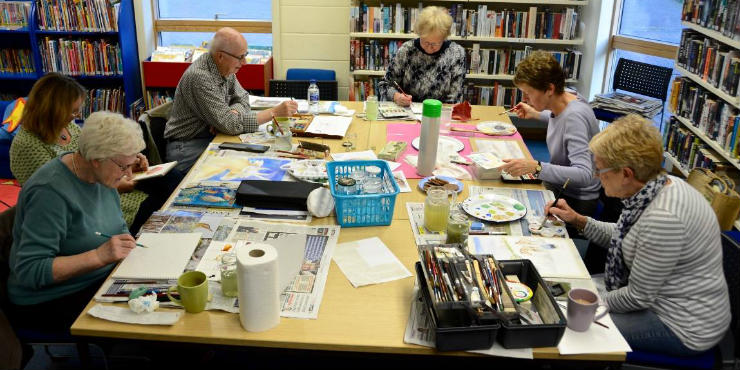 Older people participating in an art group