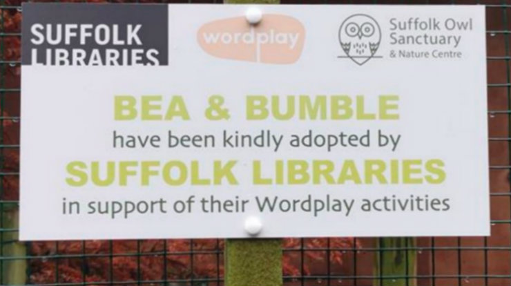 Plaque marking Suffolk Libraries' adoption of Ural owls Bea and Bumble at Suffolk Owl Sanctuary